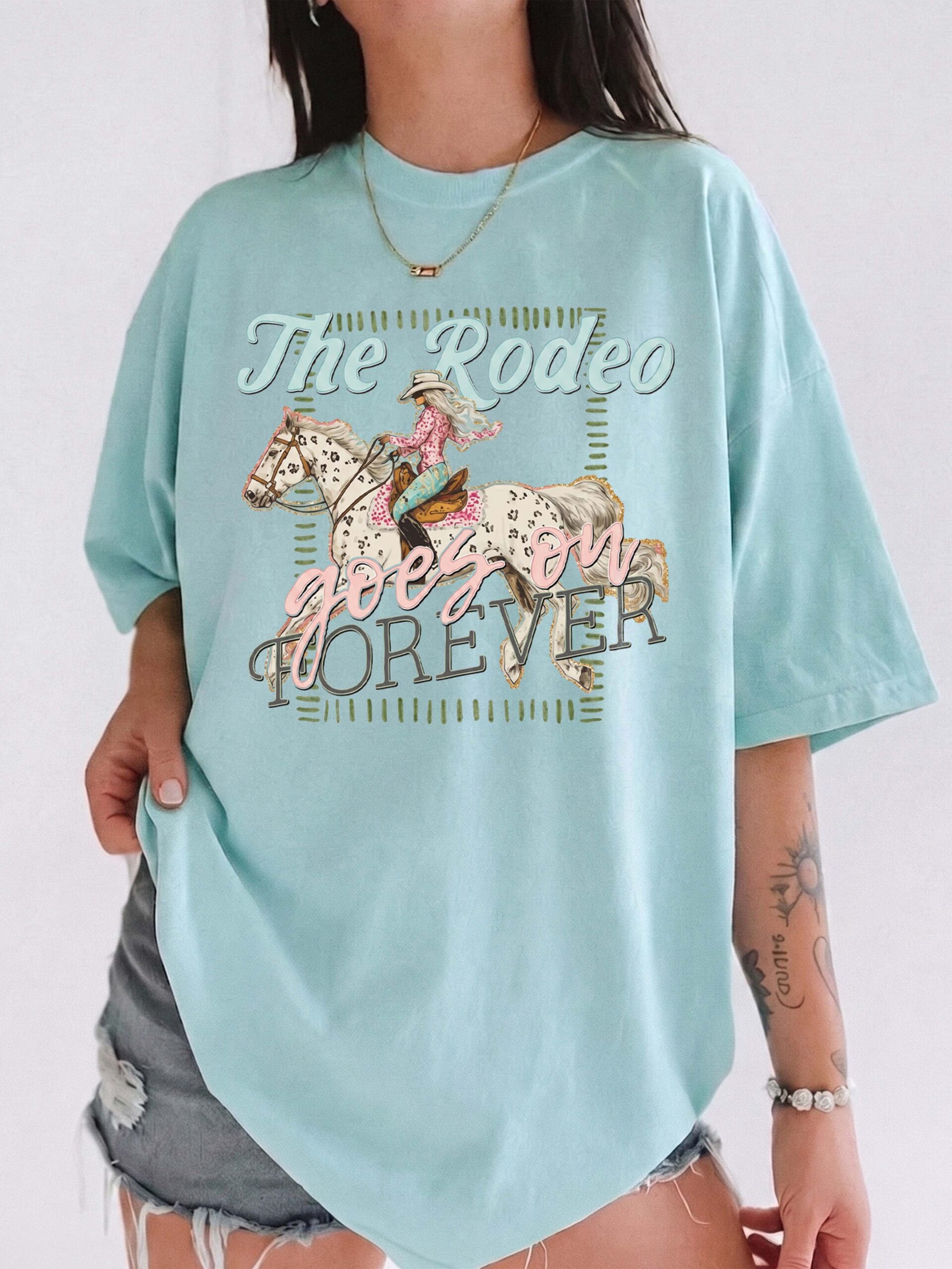The Rodeo Goes On Forever Vintage Cowgirl Graphic Tee