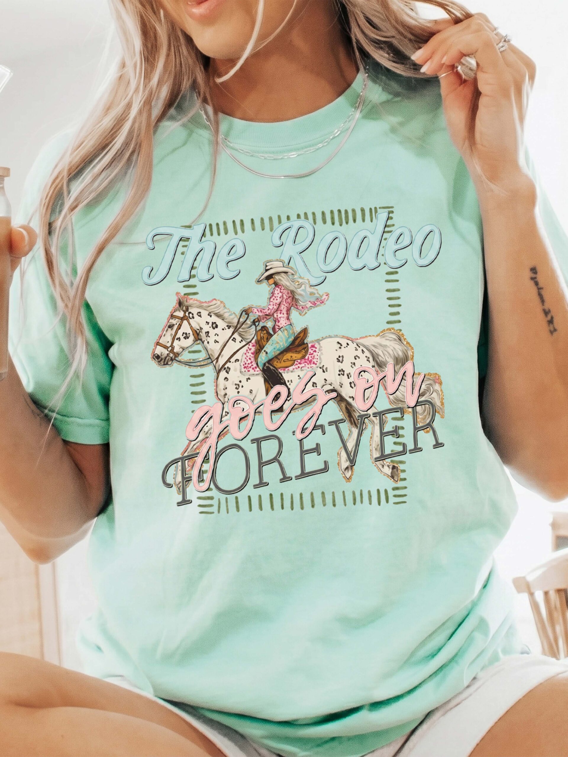 The Rodeo Goes On Forever Vintage Cowgirl Graphic Tee