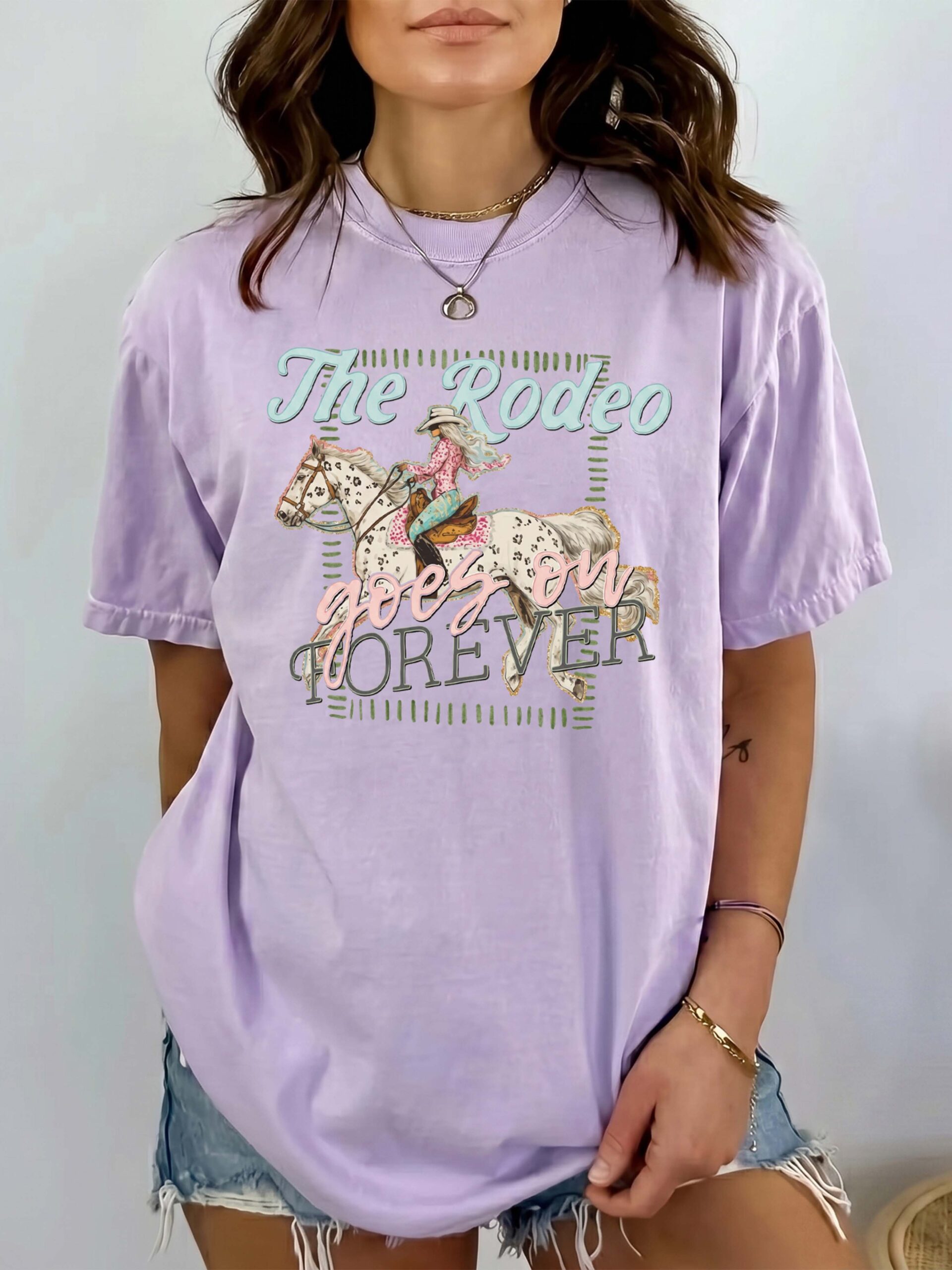 The Rodeo Goes On Forever Vintage Cowgirl Graphic Tee