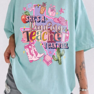 She's A Reading Teacher I Can Tell Texas Western Cowgirl Back To School T-Shirt Graphic Tee