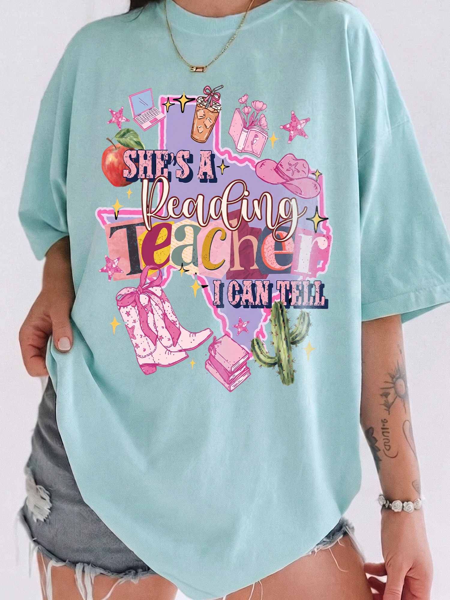 She's A Reading Teacher I Can Tell Texas Western Cowgirl Back To School T-Shirt Graphic Tee