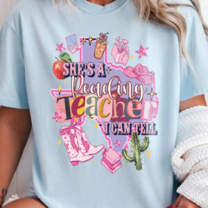 She's A Reading Teacher I Can Tell Texas Western Cowgirl Back To School T-Shirt Graphic Tee