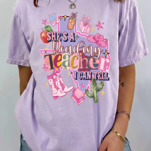 She's A Reading Teacher I Can Tell Texas Western Cowgirl Back To School T-Shirt Graphic Tee