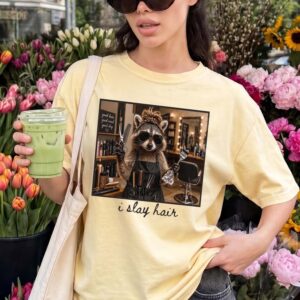 I Slay Hair Raccoon Hairstylist Graphic Tee - Funny Salon Gift