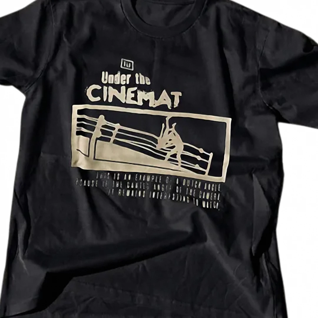 cinema-tee-under-the-cinemat-dutch-angle-shirt-film-buff-graphic-tee-for-movie-l.webp Cinema Tee Under the CINEMAT Dutch Angle Shirt, Film Buff Graphic Tee for Movie Lovers