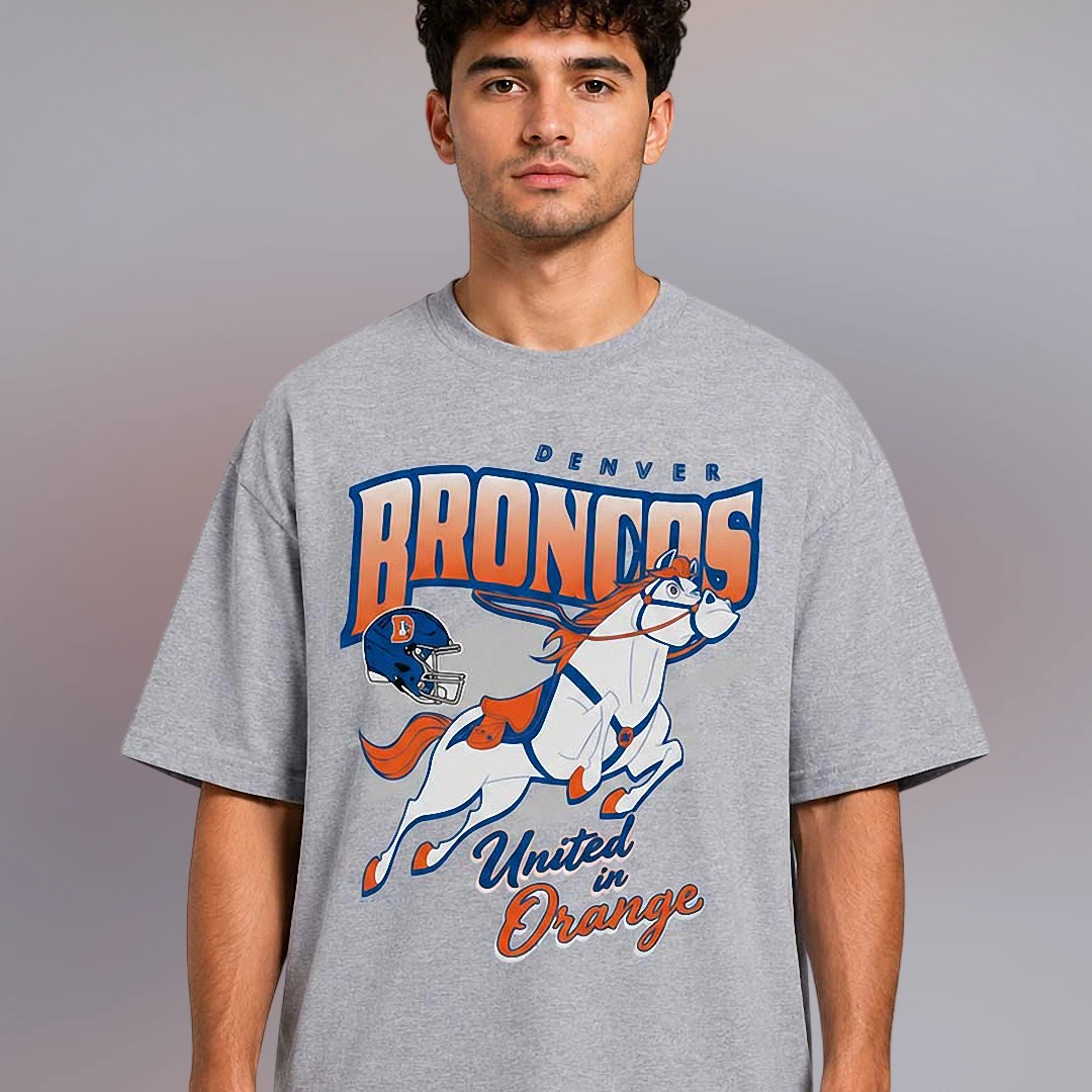Denver Broncos United in Orange Vintage Mascot Graphic Tee, — Los Angeles Denver Broncos United in Orange Vintage Mascot Graphic Tee, Retro Football Game Day Shirt available at our Los Angeles warehouse