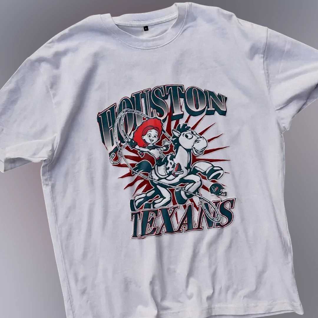 Houston Texans Jessie Toy Story Graphic Tee Vintage Football — Los Angeles Houston Texans Jessie Toy Story Graphic Tee Vintage Football Fan Shirt available at our Los Angeles warehouse