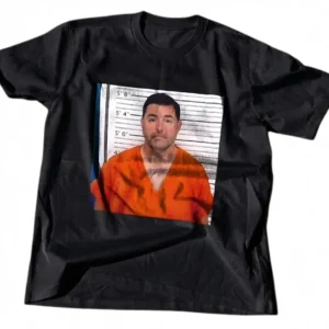 Mugshot Theme Graphic Tee Orange Inmate Prison Uniform Novelty T-Shirt for Men and Women available at our Los Angeles warehouse