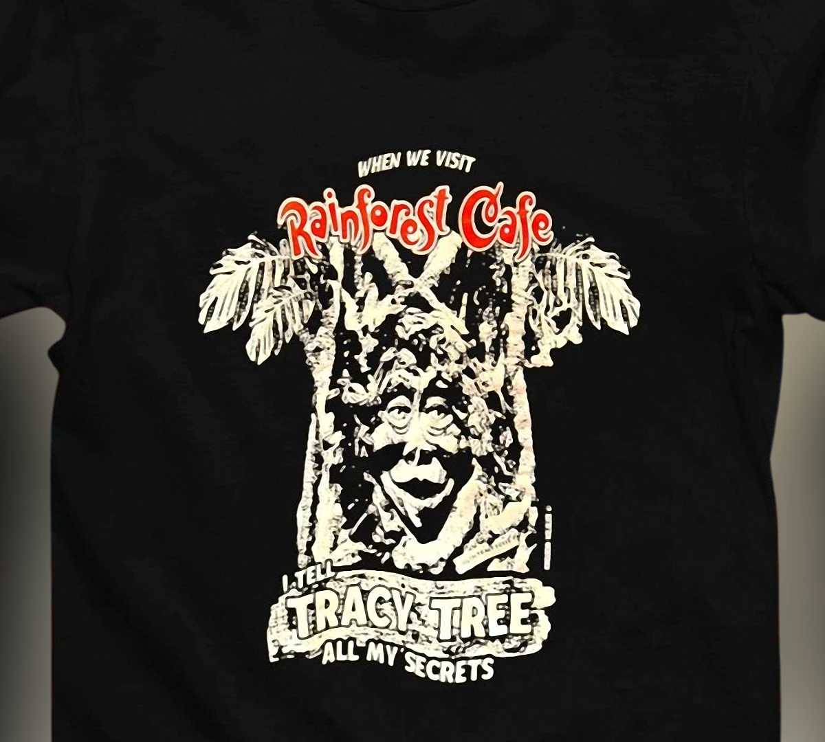 rainforest-cafe-tracy-tree-secrets-tee-funny-nostalgic-restaurant-graphic-shirt.webp Rainforest Cafe Tracy Tree Secrets Tee, Funny Nostalgic Restaurant Graphic Shirt for Fans