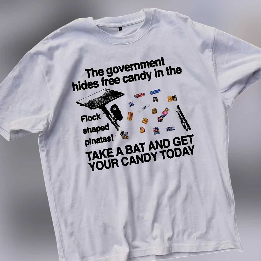 The Government Hides Free Candy in the Flock Shaped Pinatas Tee Funny Meme Graphic Shirt available at our Los Angeles warehouse