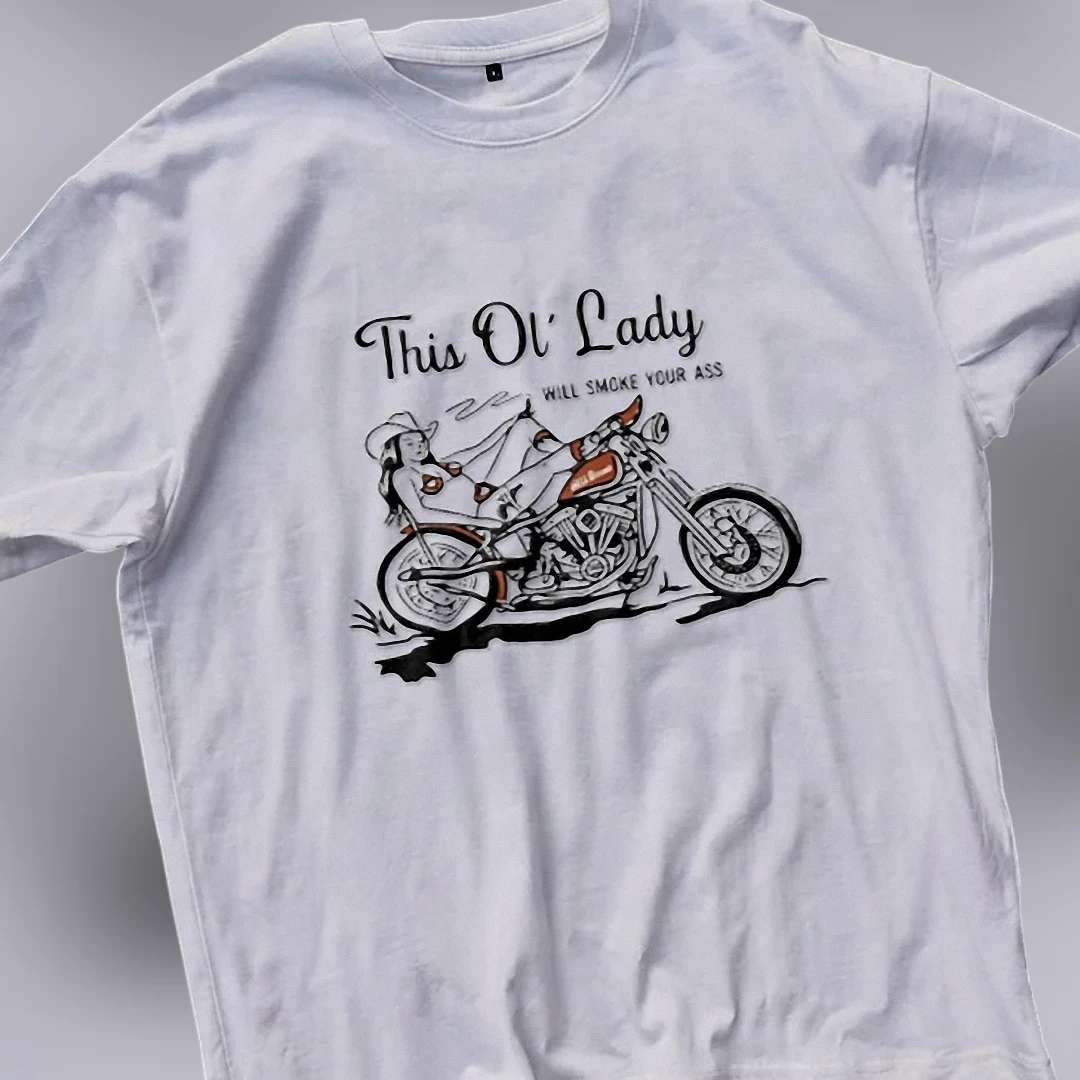 This Ol Lady Will Smoke Your Ass Tee Vintage Pin Up Biker Graphic T-Shirt for Motorcycle Lovers available at our Los Angeles warehouse