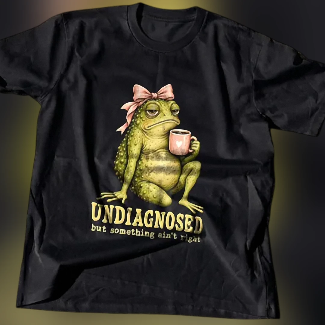 Undiagnosed But Something Ain't Right Grumpy Toad Graphic Tee, Funny Sarcastic Mental Health Meme T- available at our Los Angeles warehouse