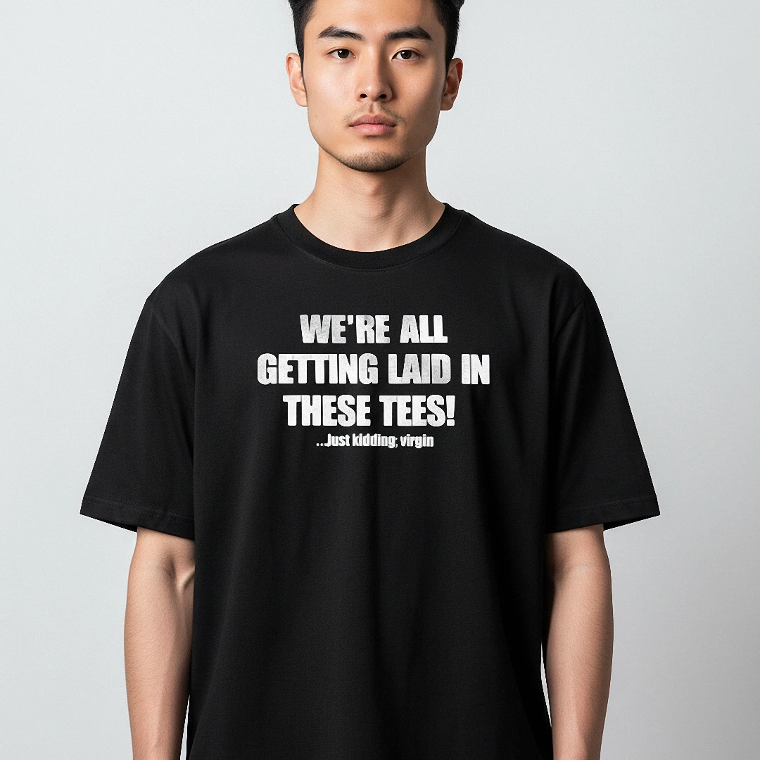 We're All Getting Laid In These Tees Virgin Slogan Tee, Funn — Los Angeles We're All Getting Laid In These Tees Virgin Slogan Tee, Funny Sarcastic Graphic Shirt available at our Los Angeles warehouse
