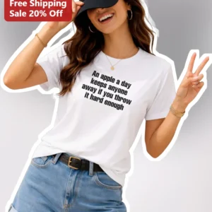 An Apple A Day Keeps Anyone Away If You Throw It Hard Enough Funny Sarcastic Quote Graphic Tee available at our Los Angeles warehouse
