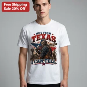 He's From Texas I Can Tell Leatherface Horror Graphic Tee, Funny Texas Chainsaw Slasher Movie Hallow available at our Los Angeles warehouse