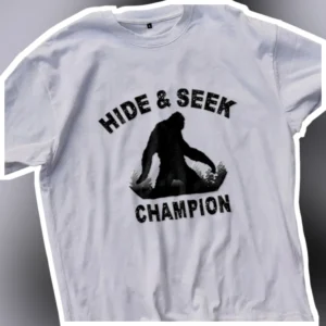 Hide Seek Champion Bigfoot Sasquatch Graphic Tee Funny Cryptid Lover Gift available at our Los Angeles warehouse