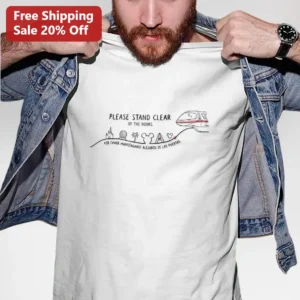 Please Stand Clear Of The Doors Bilingual Monorail Graphic Tee available at our Los Angeles warehouse