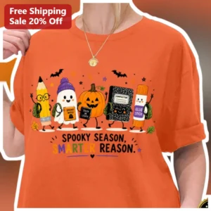 Spooky Season Smarter Reason Halloween Teacher Graphic Tee Cute School Supplies Gift available at our Los Angeles warehouse