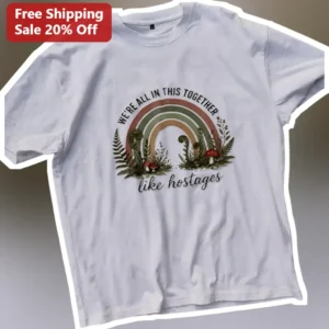 We're All in This Together Like Hostages Cottagecore Rainbow Graphic Tee available at our Los Angeles warehouse