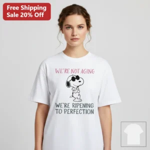 We're Not Aging We're Ripening to Perfection Snoopy Tee, Funny Birthday Gift for Peanuts Fans and Se available at our Los Angeles warehouse