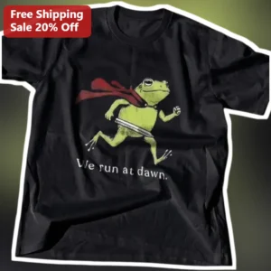 We Run At Dawn Funny Superhero Frog Graphic Tee for Early Morning Runners available at our Los Angeles warehouse