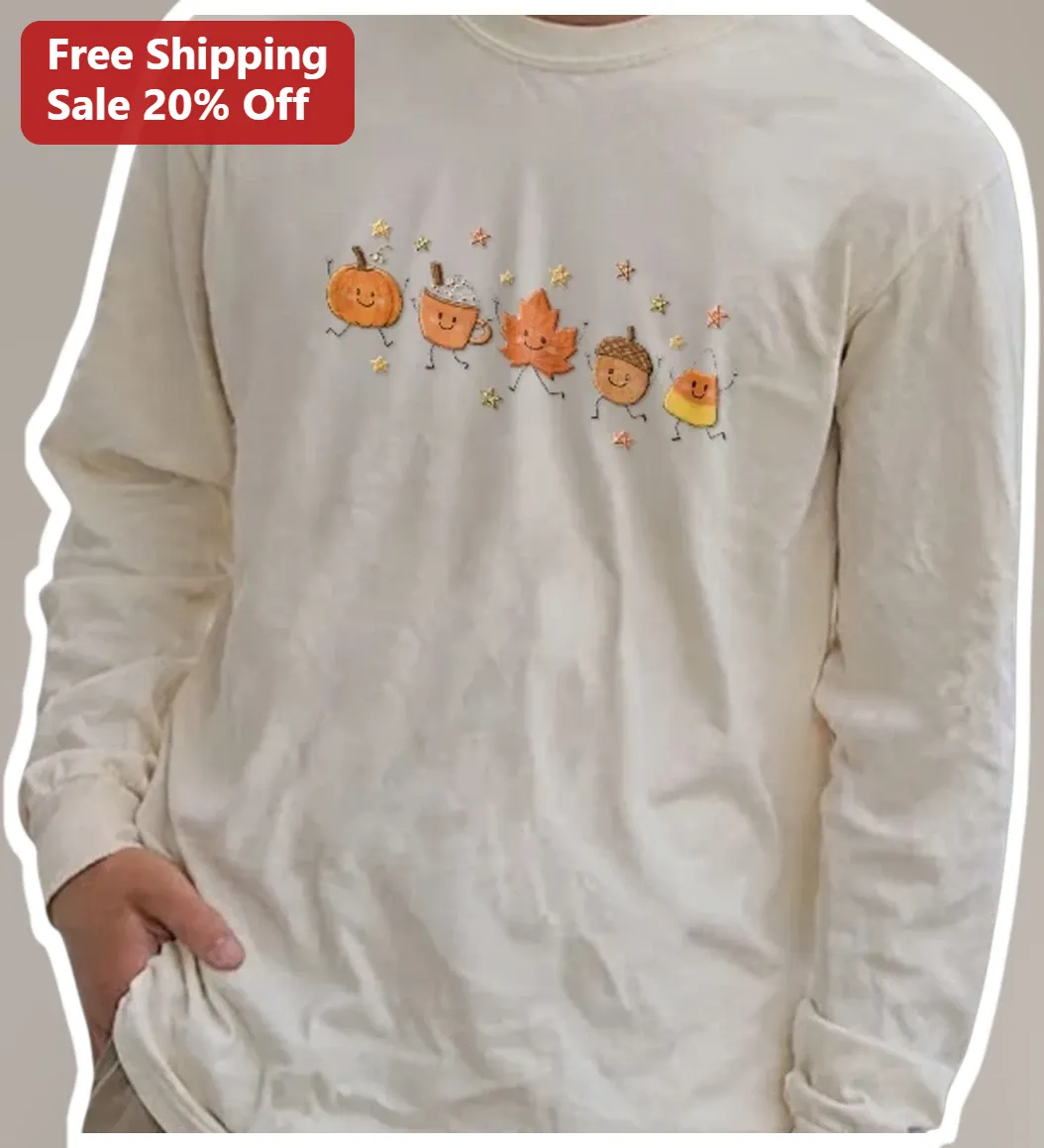 Cute Autumn Fall Characters Long Sleeve Tee Kawaii Pumpkin Maple Leaf Acorn Candy Corn Graphic Shirt available at our Los Angeles warehouse