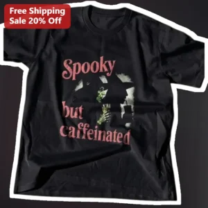 Spooky But Caffeinated Tee Halloween Coffee Lover Graphic Shirt Funny Skeleton Hand Holding Coffee C available at our Los Angeles warehouse