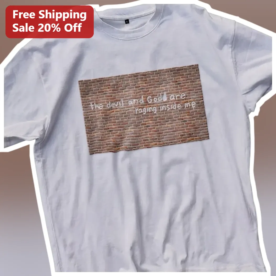 The Devil and God Are Raging Inside Me Graphic Tee Brand New Album Art Fan Gift available at our Los Angeles warehouse