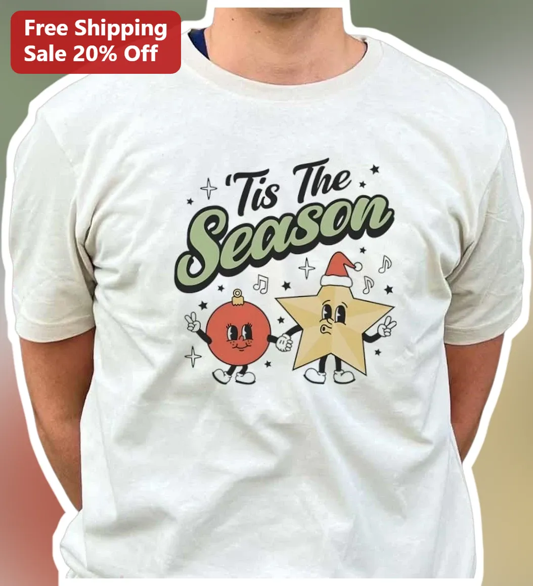 'Tis The Season Retro Cartoon Christmas Ornament Graphic Tee — Los Angeles 'Tis The Season Retro Cartoon Christmas Ornament Graphic Tee Holiday Gift available at our Los Angeles warehouse