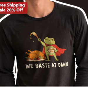 We Baste at Dawn Funny Thanksgiving Cooking Frog Long Sleeve Tee available at our Los Angeles warehouse