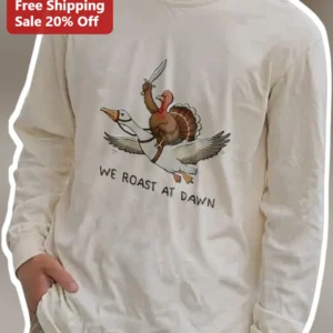 We Roast At Dawn Funny Thanksgiving Turkey Goose Rider Long Sleeve Tee Coffee Lover Gift available at our Los Angeles warehouse